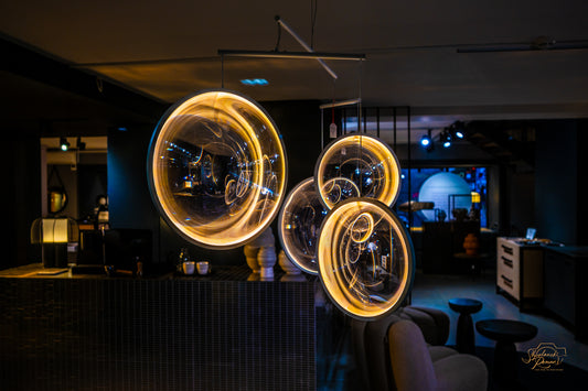 Golden spirals of light painted in a dark interior