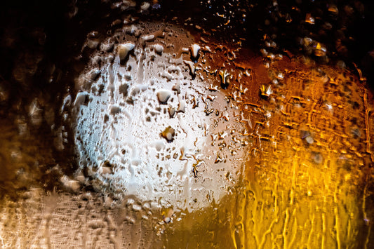 Raindrop Magic: Shimmering Glass with Bokeh Effect. Digital poster.